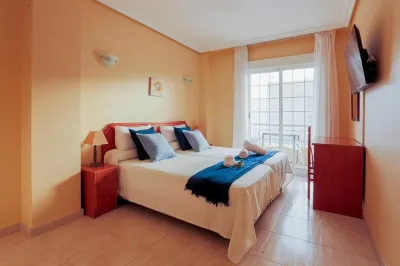 Hotel Tuto Hotels near Punta Prima Beach