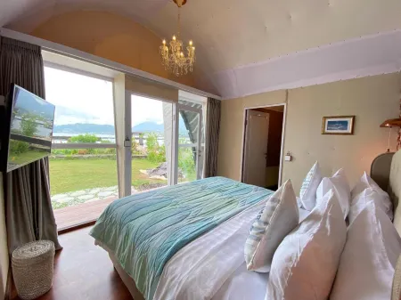 Pondanu Cabins by the Lake Отели рядом с достопримечательностью «Роуз гарден»