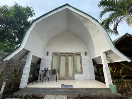 Rumah Tiga Gili Отели рядом с достопримечательностью «Slow Spa»