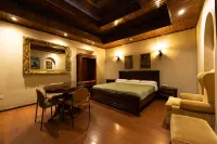Suites & Hotel El Quijote