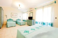 HOTIDAY Room Collection - Golfo Aranci Hotels in Golfo Aranci