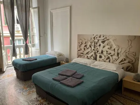 Guest House Roma Отели рядом с достопримечательностью «Кафедральный собор Сан-Лоренцо»