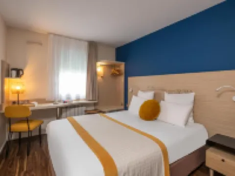 Kyriad Lyon Est - Bron Eurexpo le Cottage Hoteles en Bron