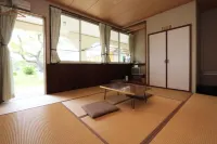 Tanegashima Minshuku Yuyu Отели в г. Минамитане