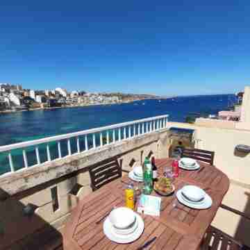 Blue Harbour Seafront Penthouse with Large Terrace with Panoramic Sea Views - by Getawaysmalta Dining/Meeting Rooms