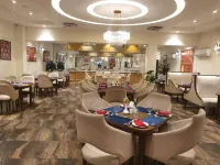 RT Grace Royal Taj Hotel Sukkur - 朝食