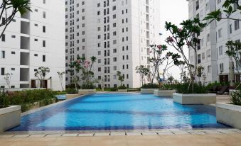 Stylish and Modern 2Br Bassura City Apartment by Travelio