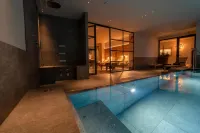 Hotel Alù Mountain Design - piscina