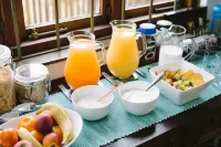 Mackaya Bella Guest House - Desayuno