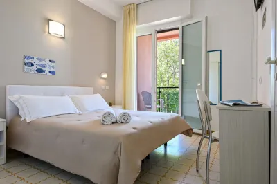 Amadei Hotel Promenade Hotels near Cozza Amara