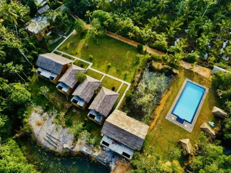 Happy Man Village Отели рядом с достопримечательностью «Sea Turtle Conservation Project»