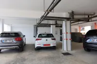 Axiothea Hotel - Parkplatz