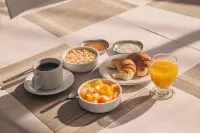 Rayentray Hostal - Bữa sáng