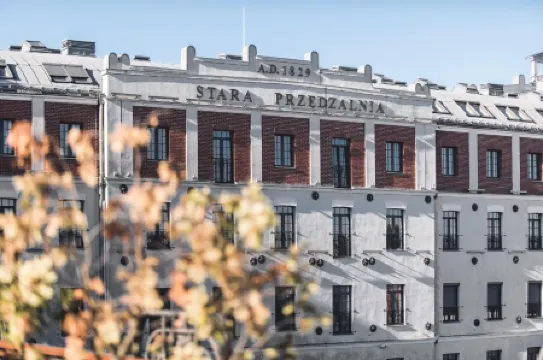 Aparthotel Stara Przędzalnia Отели в г. Жирардув