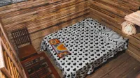 Johns Homestay Hotels near Kuttichathan Temple