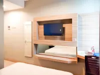 Wikost Premiere Inn Mitra RedDoorz Hotell i Plelen