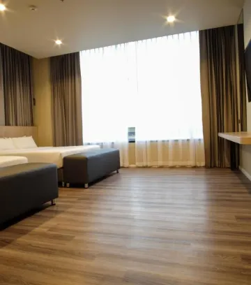 ห้องเอ็กเซ็กคูทีฟมุม พร้อมสองเตียงใหญ่