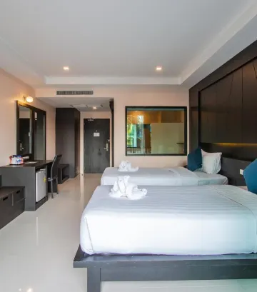 ห้องดีลักซ์เตียงแฝดพร้อมทางเข้าสระว่ายน้ำ