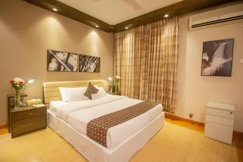 Rafflesia Serviced Apartments - Апартаменты