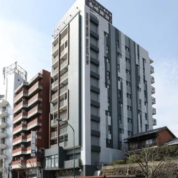 Station Hotel Nagasaki Suwa Отели рядом с достопримечательностью «Большой Н стадион»