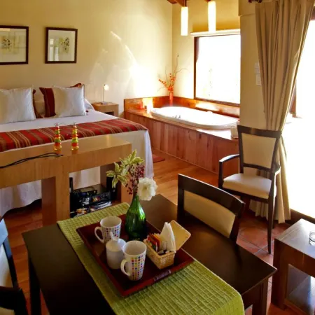 Las Ardillas Cabañas y Suites Отели в г. Пунилья