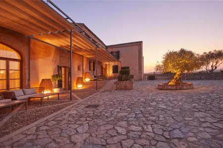 Hotel Rural Es Riquers Отели в г. Альгайда