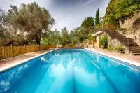 Masia Can Pou Hotel a Palol de Revardit