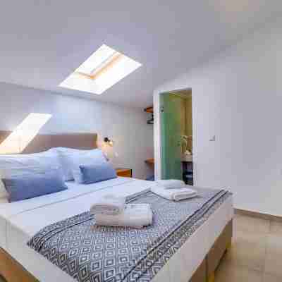 Theros Villas & Suites Rooms