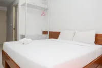 Comfy Studio Room at Patraland Urbano Apartment by Travelio