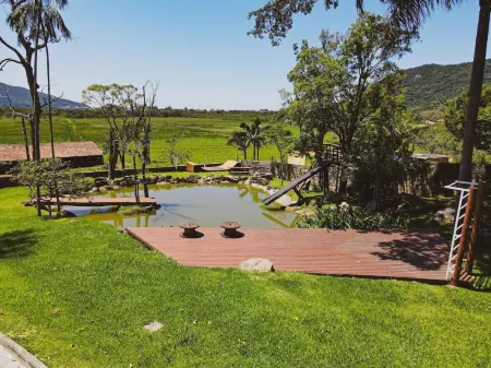 Casas de Vidro - Hospedar com Propósito Отели рядом с достопримечательностью «Lagoinha do Leste»