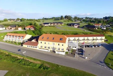 Hvalpsund Færgekro Отели в г. Farso