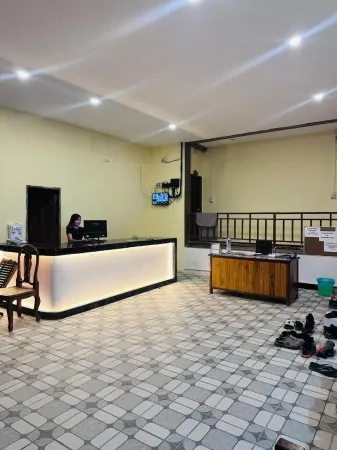 Vang Vieng Global Hostel Отели рядом с достопримечательностью «Wat That»