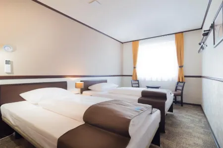 Toyoko Inn Frankfurt am Main Hauptbahnhof Отели рядом с достопримечательностью «Taunusturm»