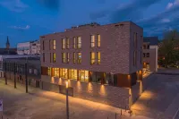 Hotel Neues Pastorat Отели рядом с достопримечательностью «Ландшафтспарк Айгенербах-Шламмтайх»