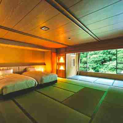 扉溫泉明神館 Rooms
