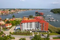 Apartamenty Premium N11 Mikołajki - Destigo Hotels - Beach