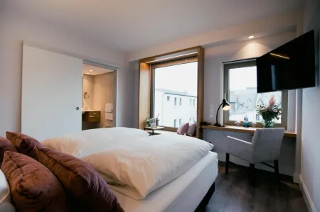 Dom Hotel Limburg Отели в г. Штайнсберг