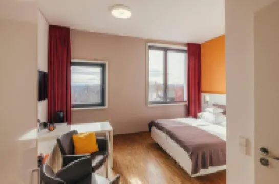 Gzt Das Gästehaus โรงแรมในทือบิงเงิน