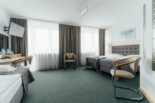 Hotel Logos Отели рядом с достопримечательностью «Памятник Николаю Копернику»