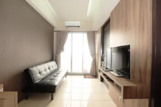 Minimalist 2Br Serpong Greenview Apartment by Travelio