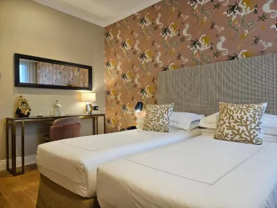 Jolly Charme Suite Hotels near Astronomical Clock of the Cathedral of Messina