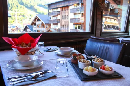 Hotel le Christiania Отели рядом с достопримечательностью «Golf Les Gets»