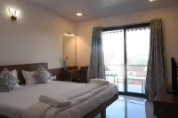 Stone shelter Hotels in Bhilar