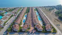 Sunset Beach Resort Aqua Lettings Hotel di Karagedik Mahallesi