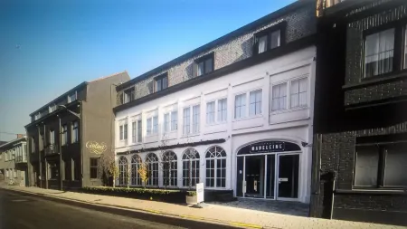 Hotel Cortina Отели в г. Мускрон