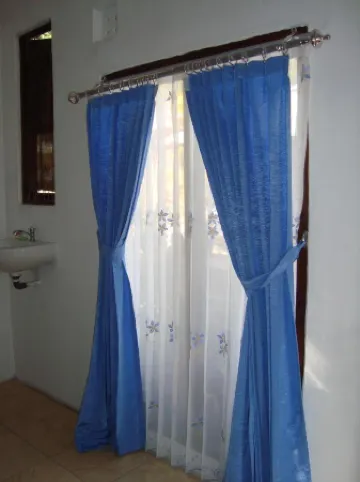 Taman Ayu Homestay Munduk Mitra RedDoorz Отели рядом с достопримечательностью «Водопад Мундук»