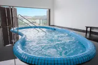 Serene Mossy Family Cottage(2-7Pax) 10 Min to Boh Hotels in Ulu Telom