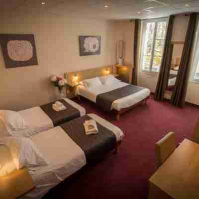 Hôtel Le Castel Fleuri Rooms