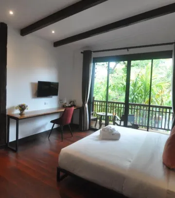 ห้องดีลักซ์ เตียงใหญ่ 1 เตียง