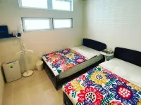 UmiOto Miyakojima Guest House with Night Pool - Pensions